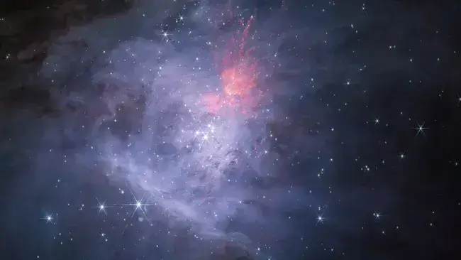 Os planetas que parecem estar a enviar sinais de rádio encontram-se na Nebulosa de Órion, vista aqui numa imagem infravermelha captada pelo Telescópio Espacial James Webb.
